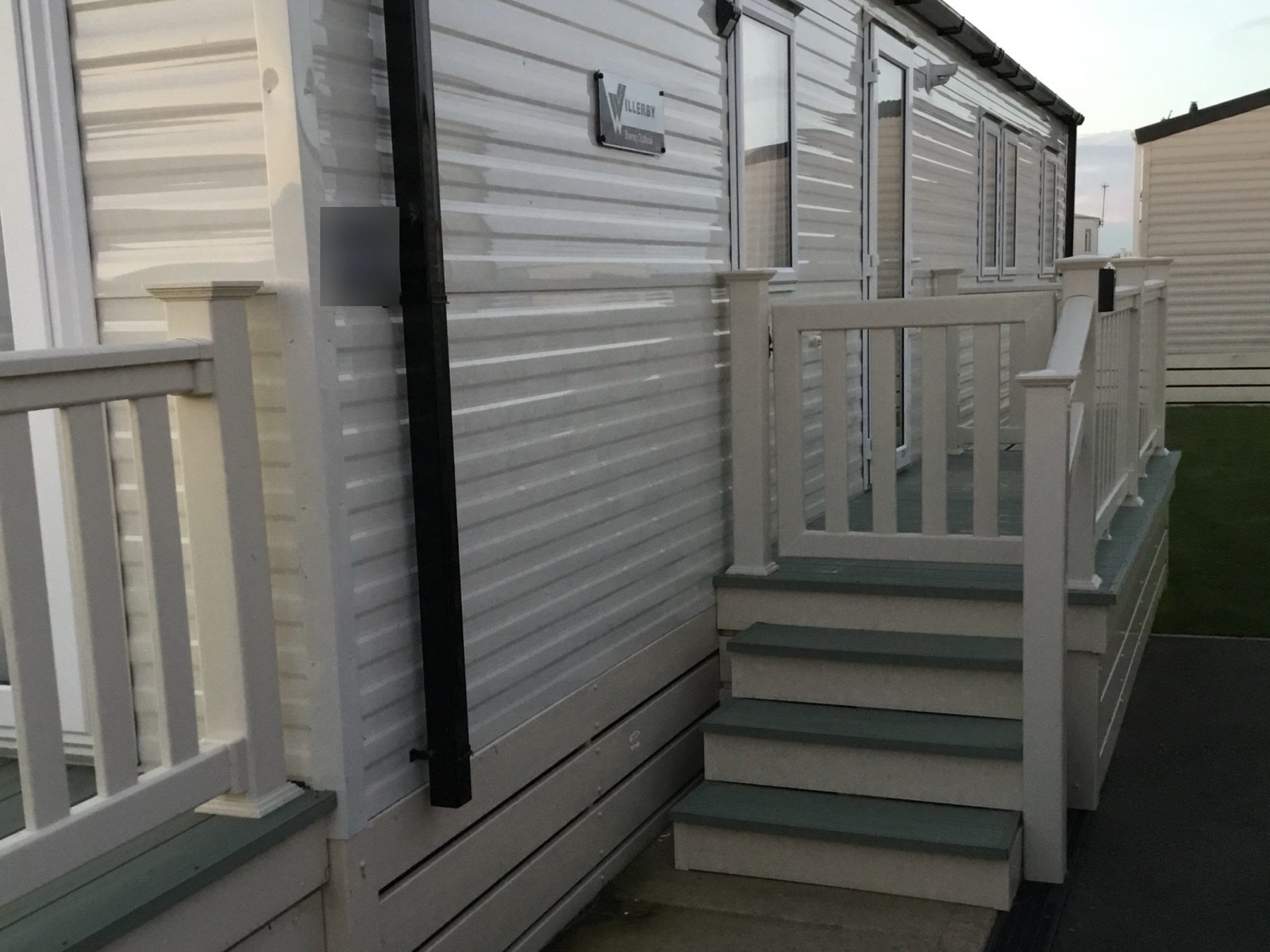 Steps up to the decking at the side of the holiday home